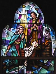Mary, Joseph and the infant Jesus at the manger
